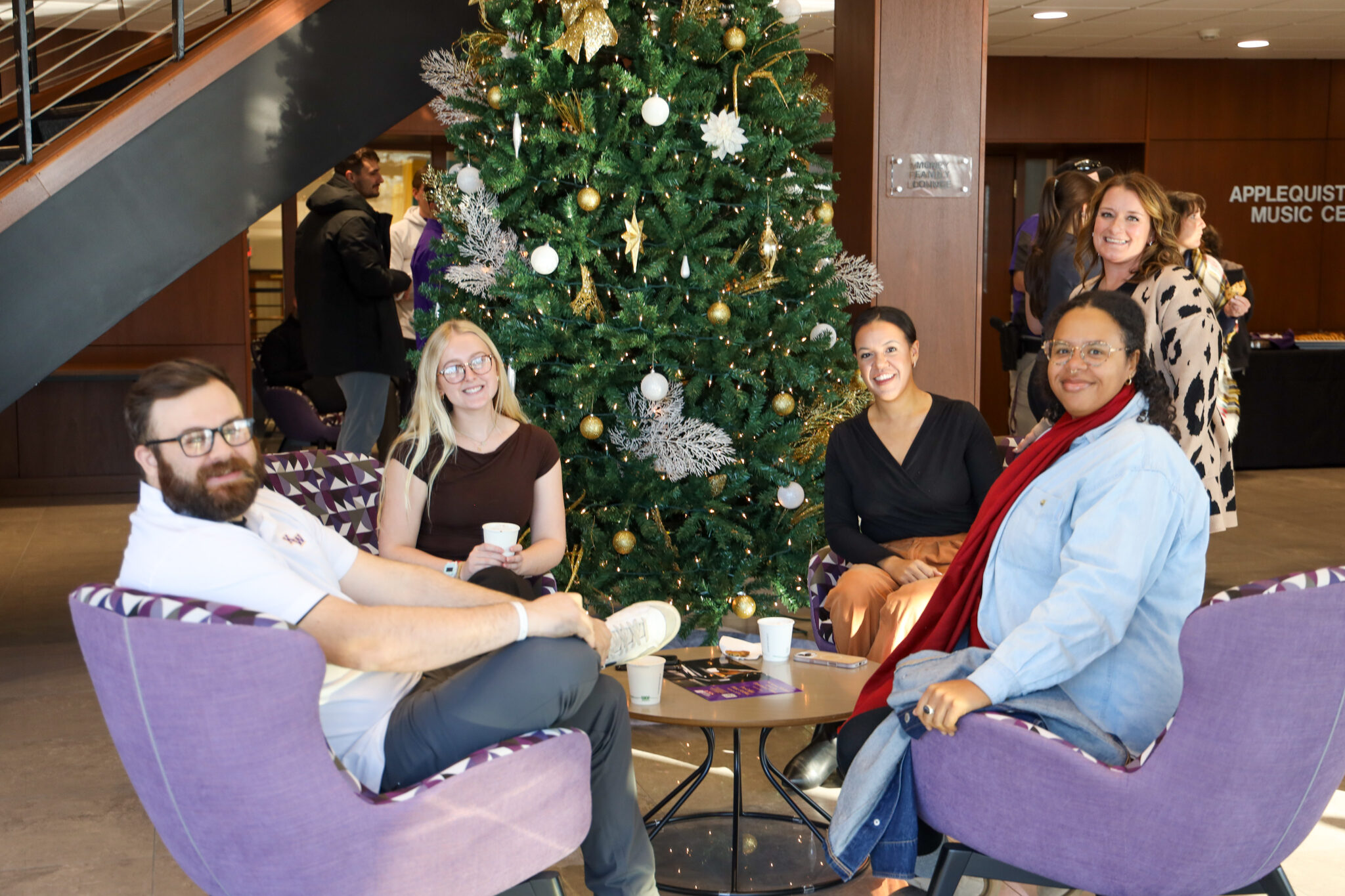 Group of people in chairs talking