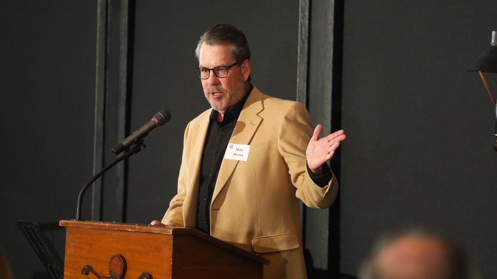Man talking at podium
