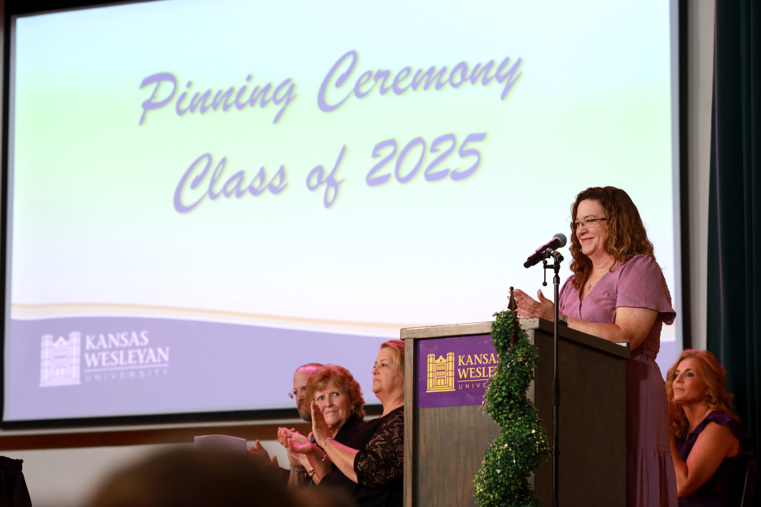 Female speaker at podium
