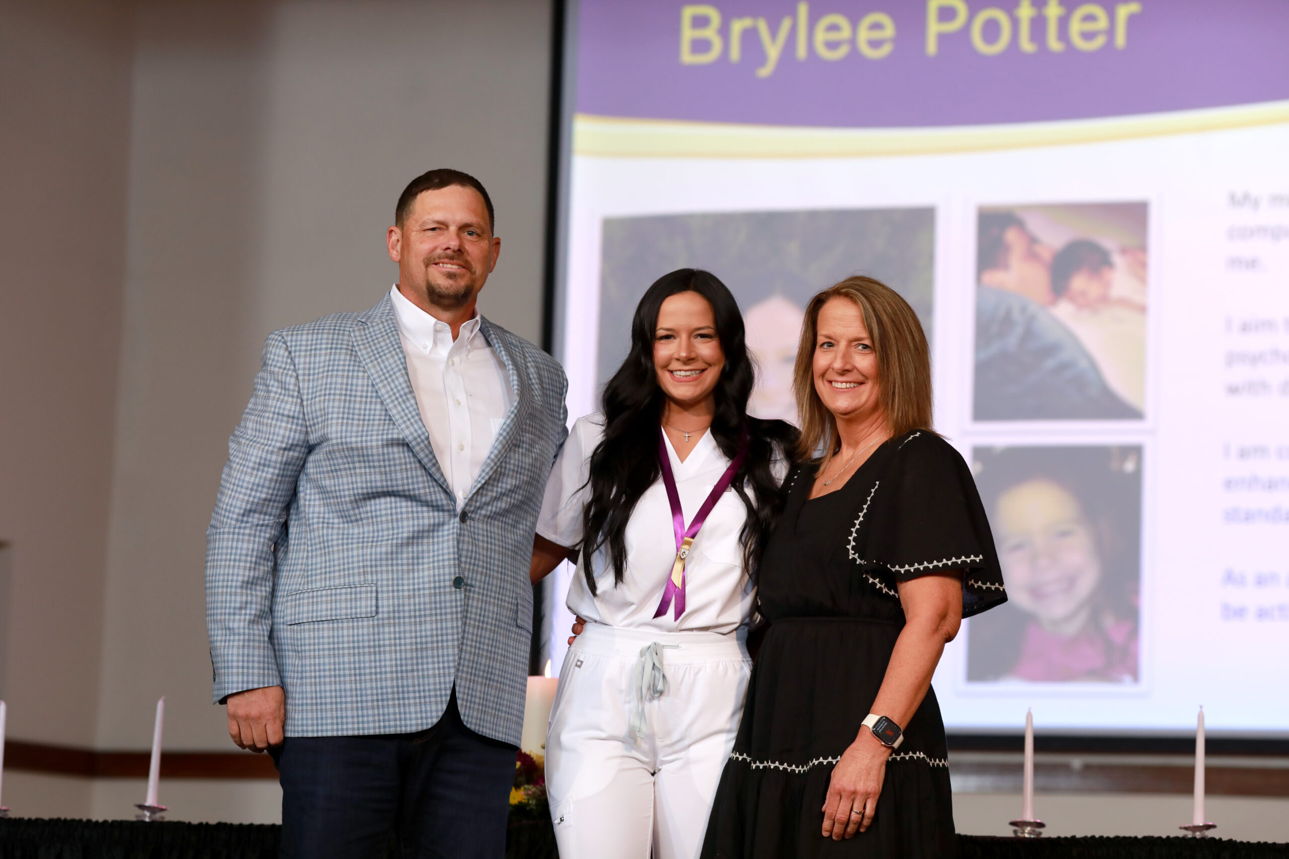 Nursing graduate with family