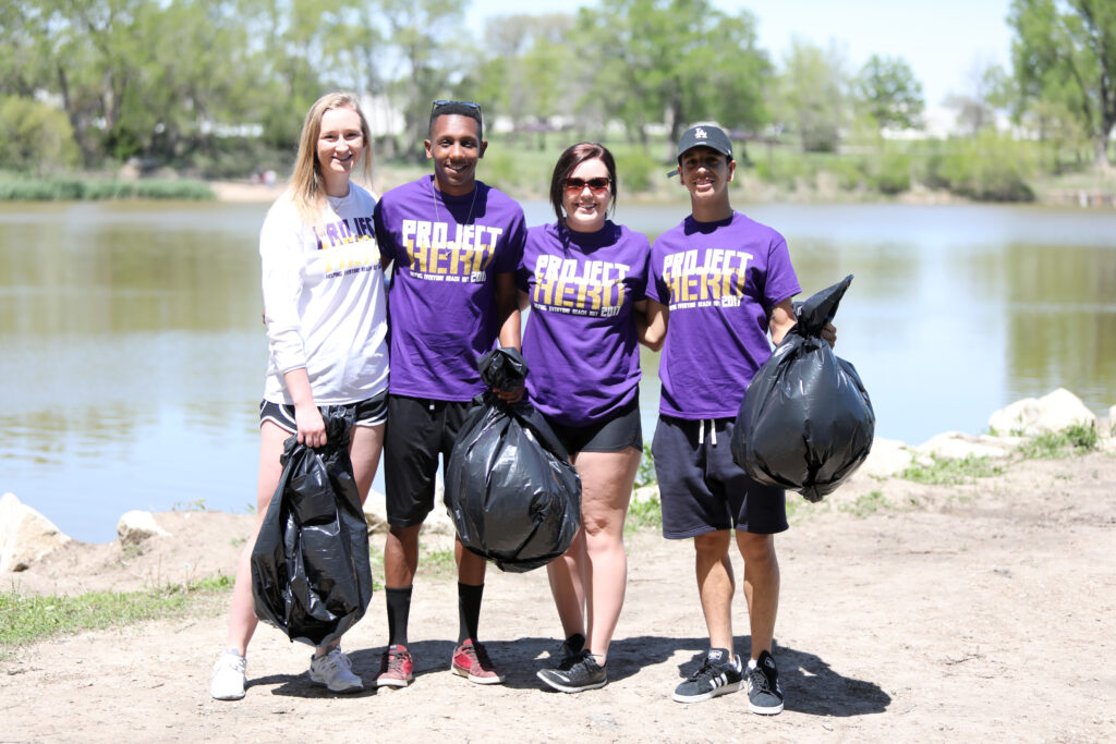 Students with bags of trash