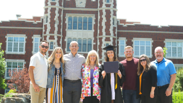 KWU student with family at graduation