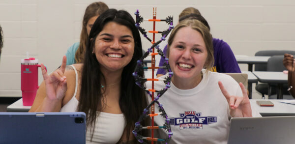 Two women in biology class