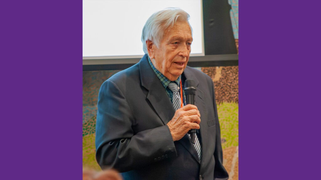 Man speaking into microphone