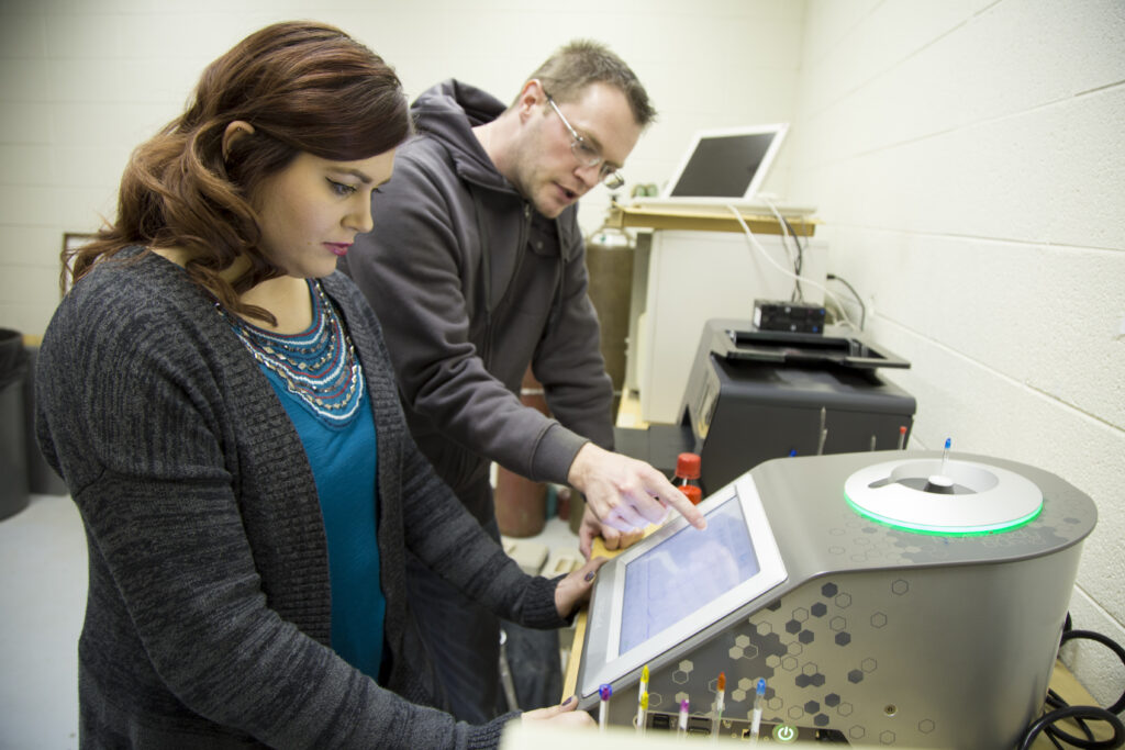 Instructor teaching physics
